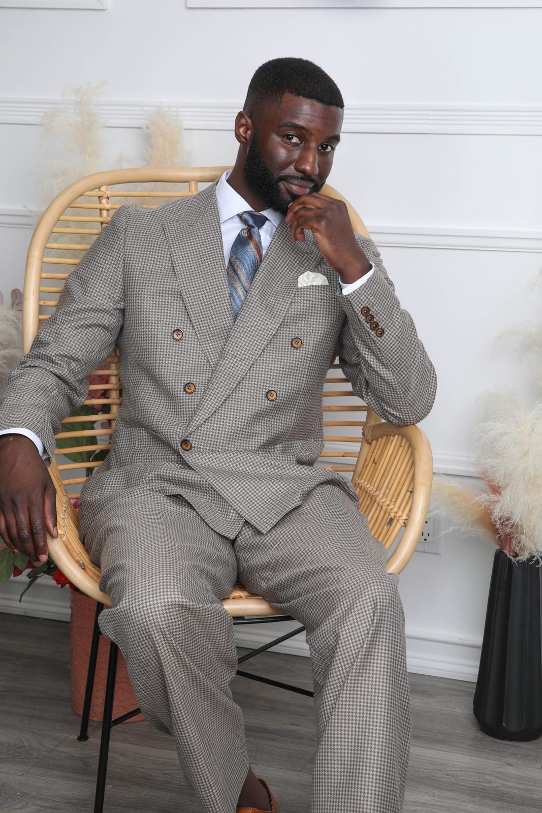 Marcus R. Smith — editorial tailoring, double-breasted houndstooth suit