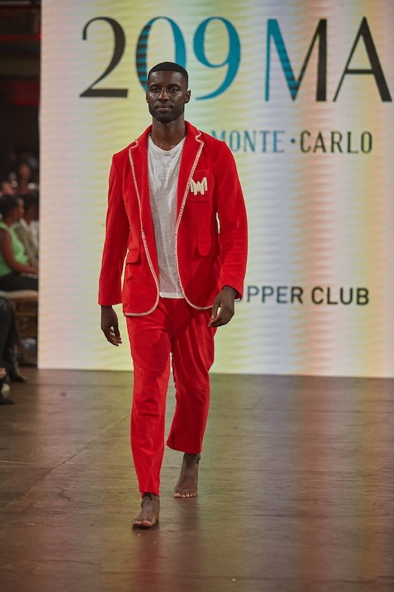 Marcus R. Smith — New York Fashion Week runway, red suit